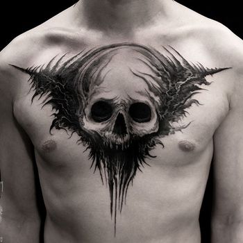 Татуировка мужская хоррор на груди череп