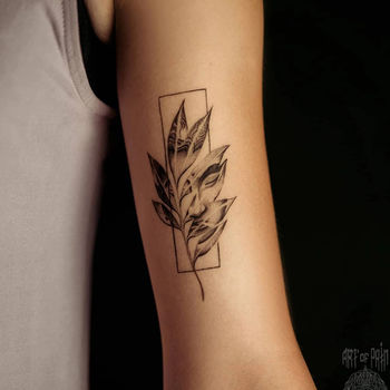 Татуировка женская графика на руке Будда и растение